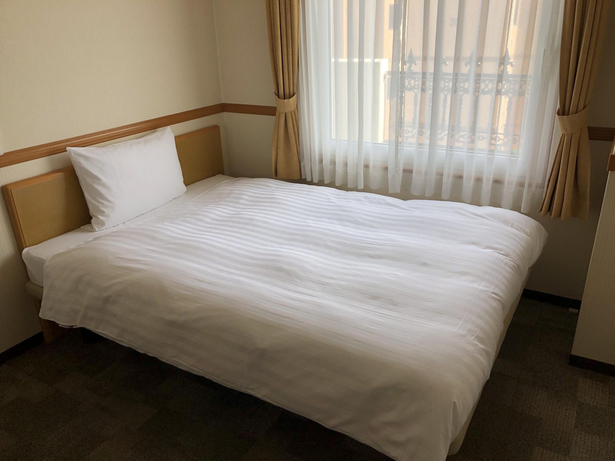 Toyoko Inn Osaka Hankyu Juso-Eki Nishi-Guchi No.1 Екстериор снимка